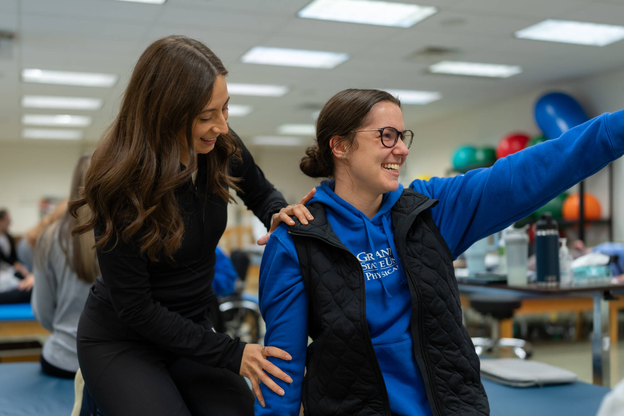 Student & instructor in lab